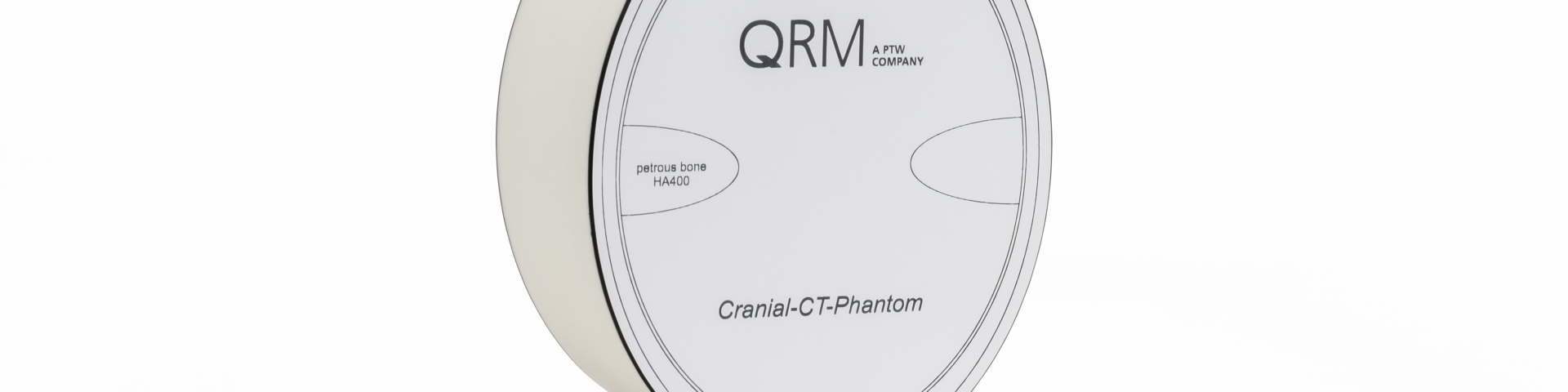 QRM phantom based on a brain-equivalent plastic with a constant CT-number for different kV settings surrounded by bone structures imitating the X-ray absorption of the human skull